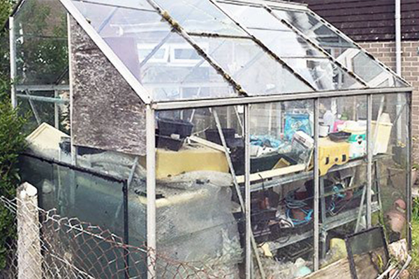 An image showing a messy green house